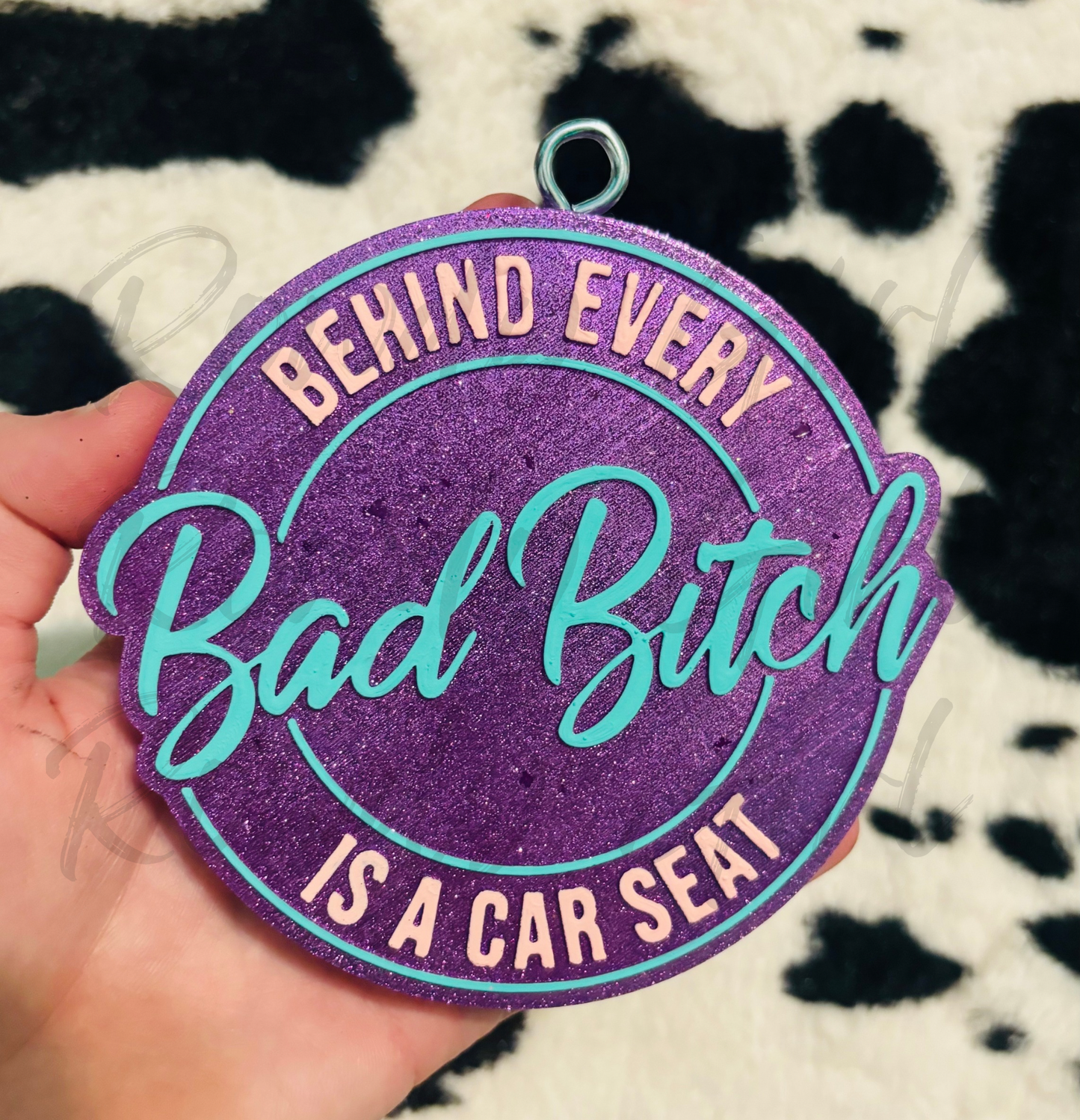 Behind ever Bad B is a Car seat