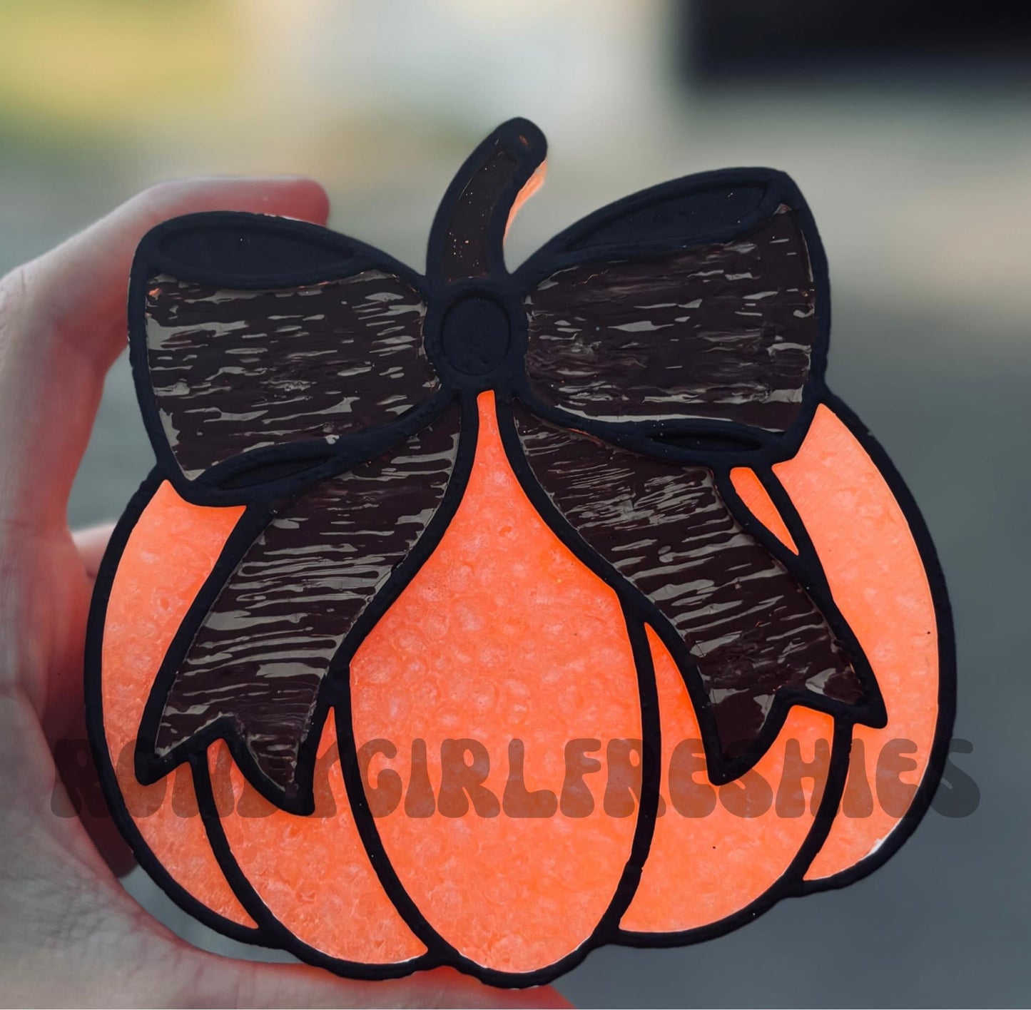 PUMPKIN WITH A CAMO BOW