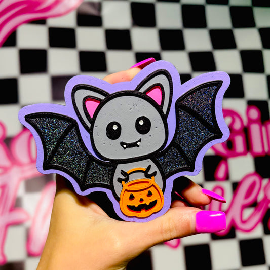 Bat with a candy basket